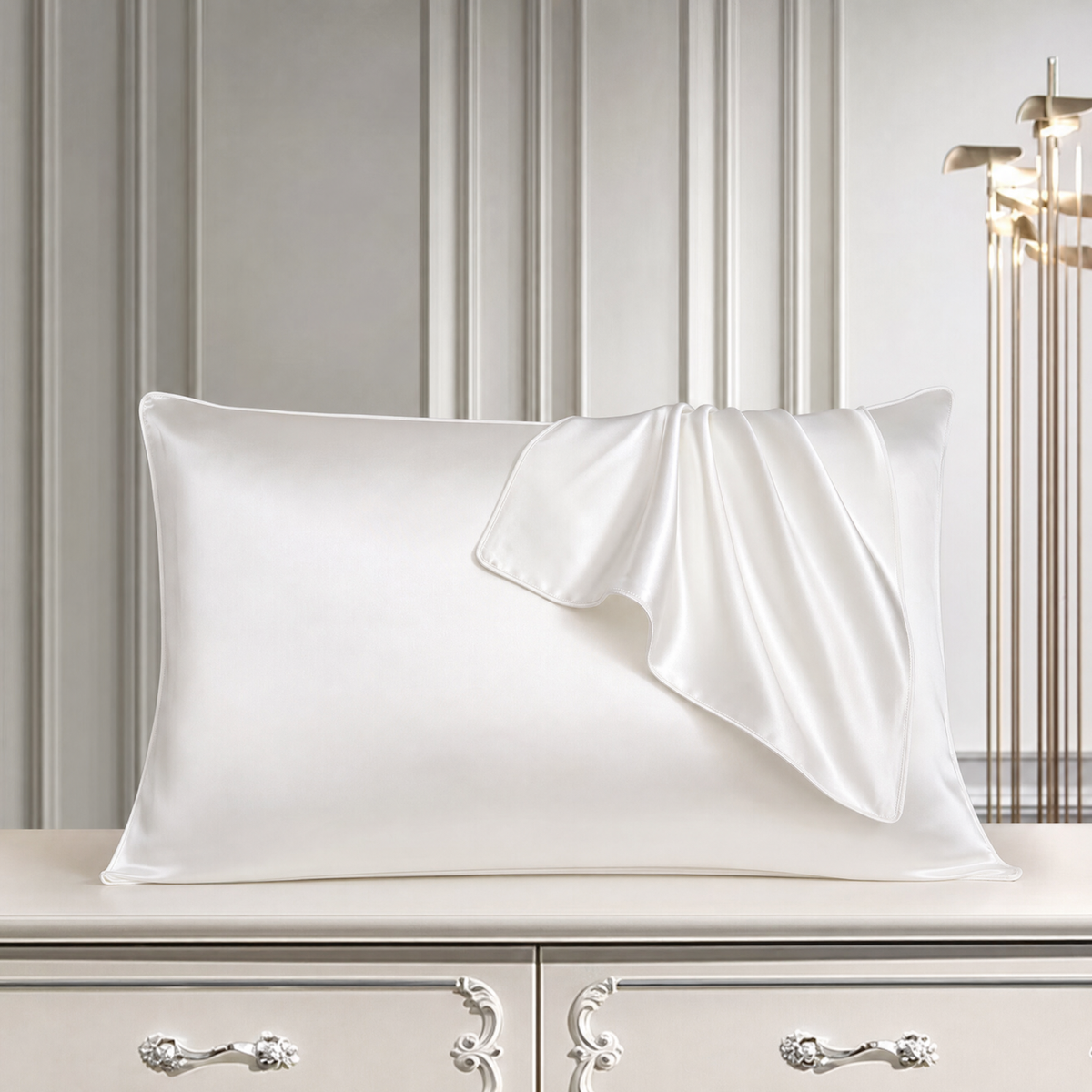 Mulberry silk pillowcase in White, styled with a folded silk corner